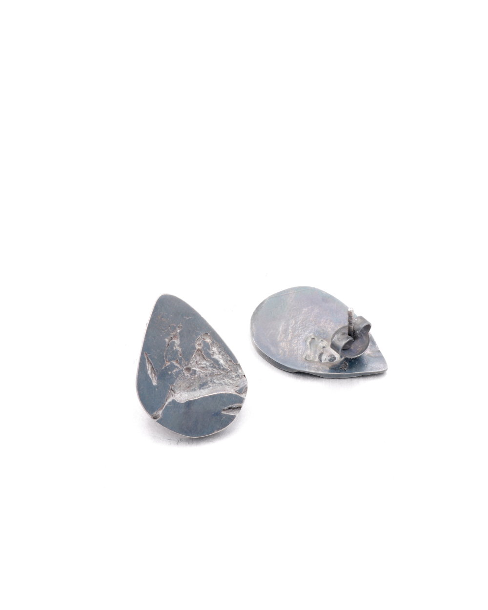 textured drop shaped earrings in Sterling silver.